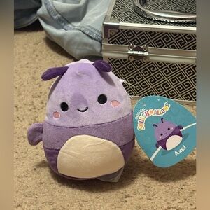 NWT purple bug Squishmallows whose name is Axel